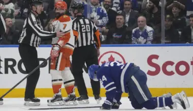 Anaheim Ducks defenseman Radko Gudas (7) looks at an injured Toronto Maple Leafs forward Auston Matthews (34) after he delivered a knee on knee hit during the second period at Scotiabank Arena