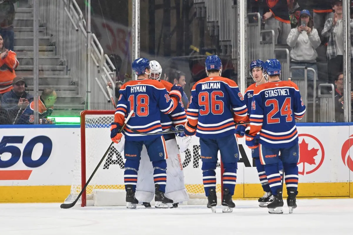 Edmonton Oilers goalie Connor Ingram (39) along with left winger Zach Hyman (18) and defenseman Jake Walman (96) and defenseman Spencer Stastney (24) celebrate their win over the San Jose Sharks during the third period at Rogers Place: