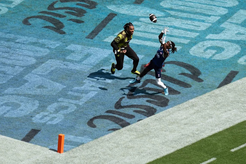 A Team USA wide receiver jumps for a touchdown catch during the Fanatics Flag Football event, March 21, 2026, in Los Angeles.