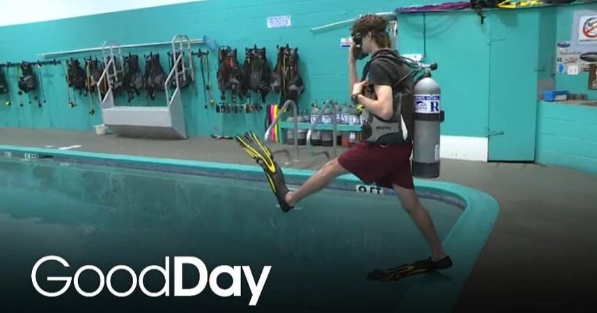 Ryan is getting a diving lesson with Dolphin Scuba Center