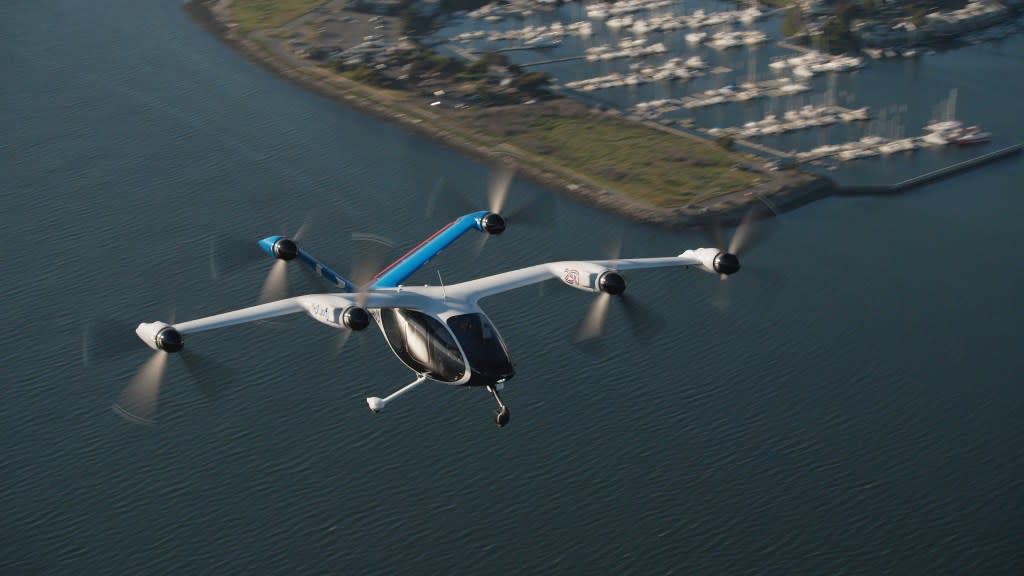 The small electric aircraft flew across San Francisco Bay near the Golden Gate Bridge. Joby