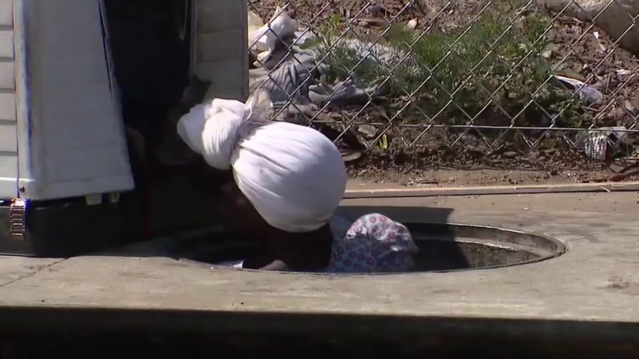 Woman's storm drain home now declared hazmat zone