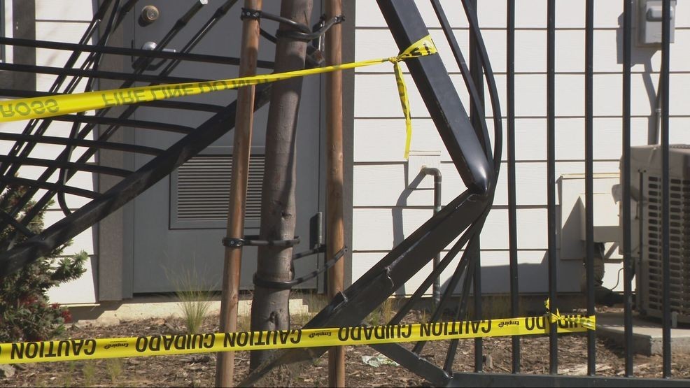 A person allegedly stole a John Deere front loader and hit an apartment building on Hughes Lane, injuring a woman inside. PHOTO: KBAK/KBFX