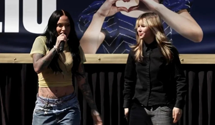 Kehlani, left, and Alysa Liu appear on stage for a homecoming rally outside Oakland City Hall on March 12, 2026.