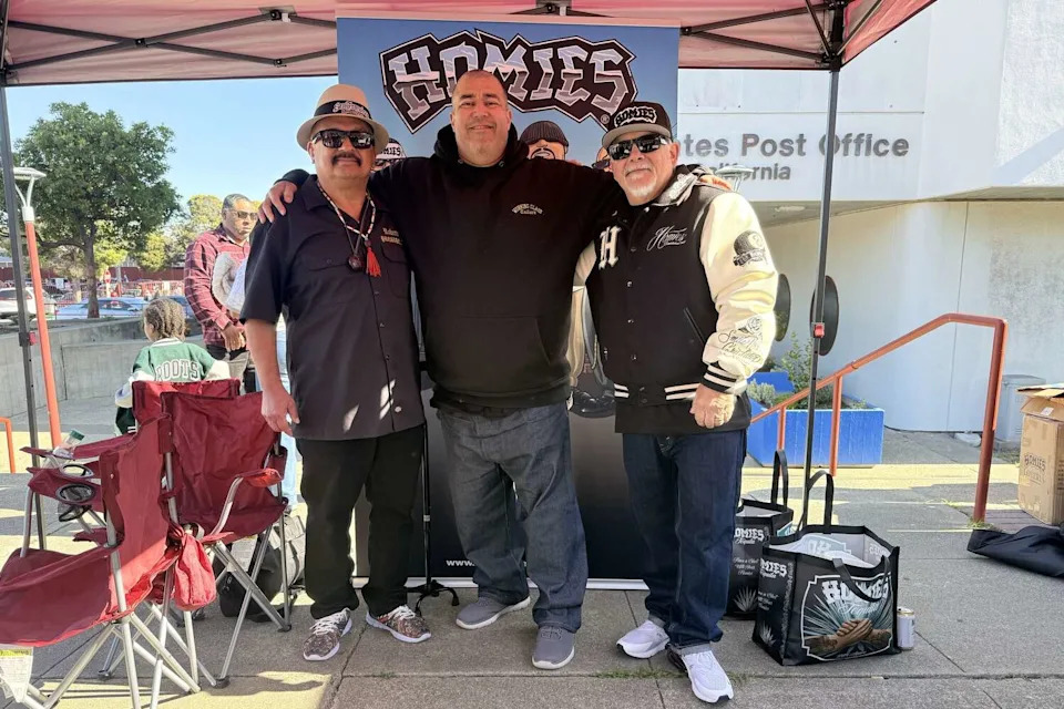 From left: Roberto Hernández, president of the San Francisco Lowrider Council; Humberto "Beto" Mendoza, artist of the lowrider Forever stamps; and David Gonzales, creator of the Homies toy line. (Courtesy of Angelita Peter)