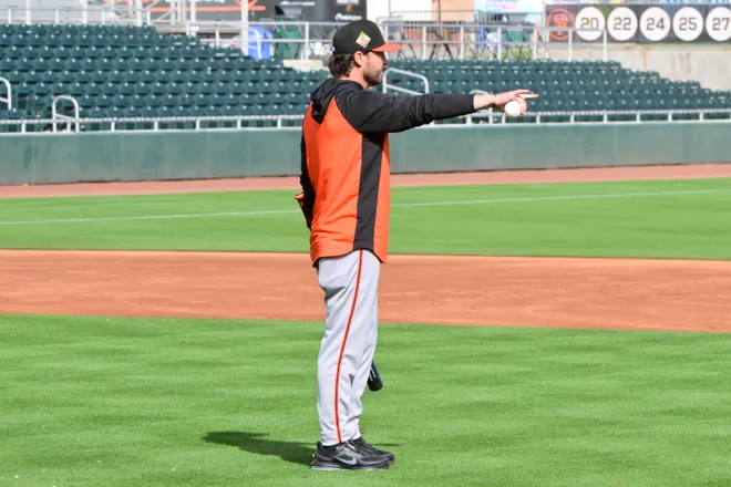 Feb. 18, 2026; Scottsdale, Arizona; San Francisco Giants manager Tony Vitello (23) looks on during a Spring Training workout at Scottsdale Stadium.
