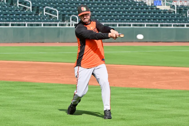 Feb. 18, 2026; Scottsdale, Arizona; San Francisco Giants manager Tony Vitello (23) hits a ball during a Spring Training workout at Scottsdale Stadium.