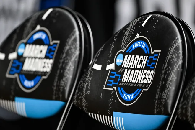 Mar 25, 2026; San Jose, CA, USA; The March Madness logo is seen on chairs during a Texas Longhorns practice session ahead of the west regional of the men's 2026 NCAA Tournament at SAP Center. Mandatory Credit: Eakin Howard-Imagn Images