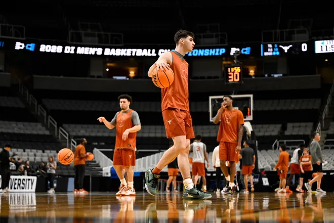 Mar 25, 2026; San Jose, CA, USA; Texas Longhorns guard Anthon McDermott (33) dribbles during a practice session ahead of the west regional of the men's 2026 NCAA Tournament at SAP Center. Mandatory Credit: Eakin Howard-Imagn Images
