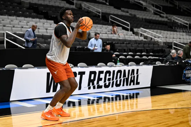 Mar 25, 2026; San Jose, CA, USA; Texas Longhorns forward Declan Duru Jr. (4) shoots during a practice session ahead of the west regional of the men's 2026 NCAA Tournament at SAP Center. Mandatory Credit: Eakin Howard-Imagn Images