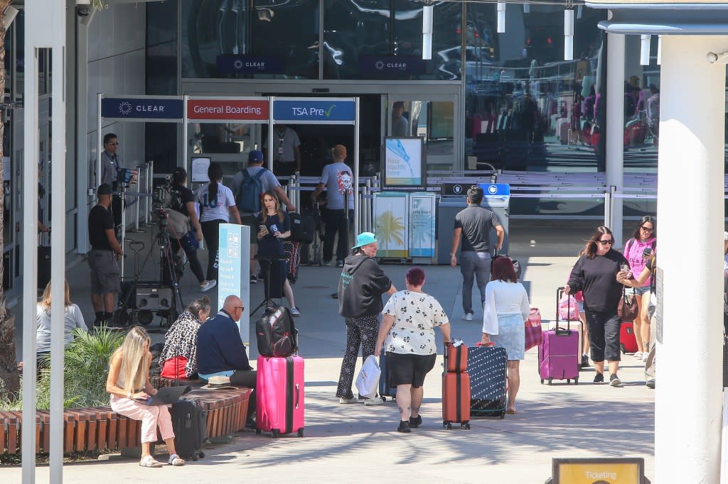 People enter the TSA security area at Long Beach Airport. Rafael Fontoura for CA Post