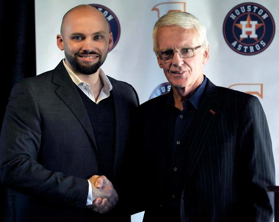 Derek Franks, left, poses with a photograph with team president Chris Cummings, right, after Cummings announced Franks as the new general manager for the Fresno Grizzlies at a press conference March 5, 2015 held at Chukchansi Park in Fresno, Calif. 