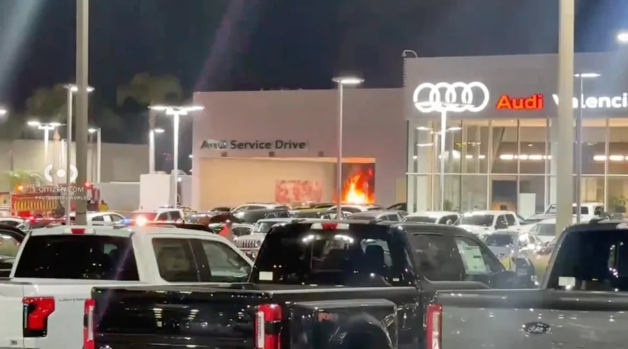 Flames erupt at Audi dealership