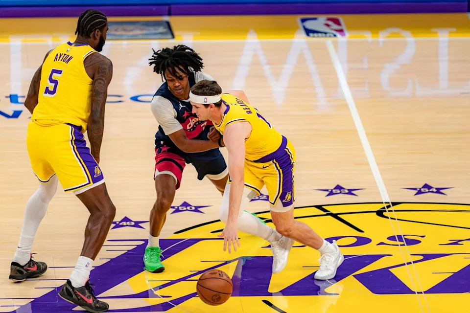 Los Angeles Lakers guard Austin Reaves (15) dribbling during an NBA basketball game against the Washington Wizards on March 30th, 2026 in Los Angeles, CA.