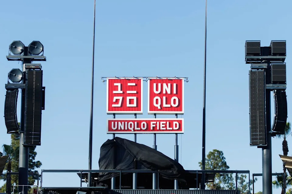 The UNIQLO Field signage is revealed in center field during a UNIQLO partnership press conference on March 25, 2026 in Los Angeles, California.