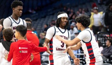 Modesto Christian starters Siincere Hudson (3) and Somto Patrick leave the court with victory in hand late in the fourth quarter of the CIF Sac-Joaquin Section Division I championship game against Sheldon at Golden 1 Center in Sacramento on Saturday. Modesto won the game 55-42.