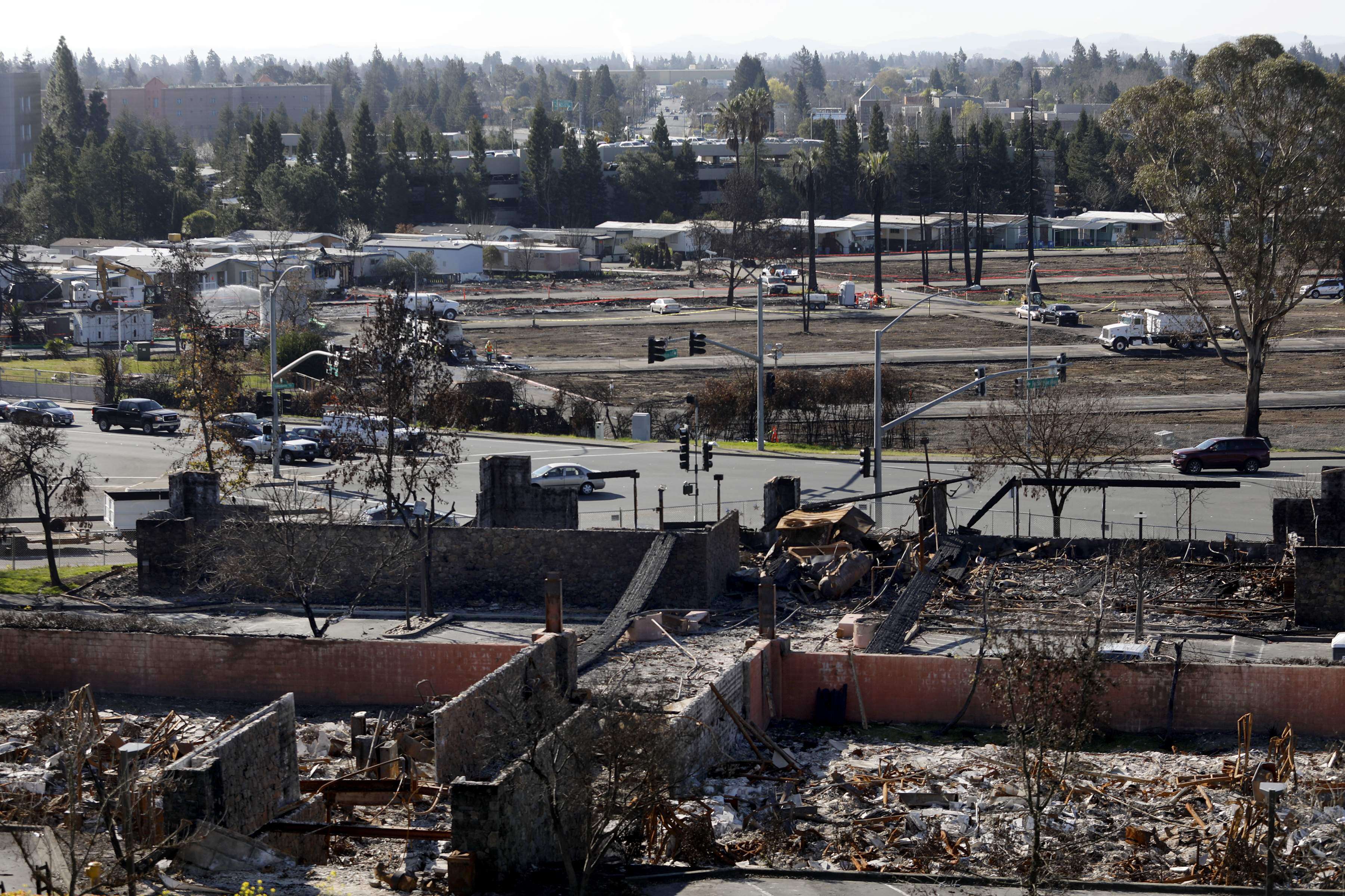 Cleanup work continues at the Fountaingrove Inn and Journey's End...
