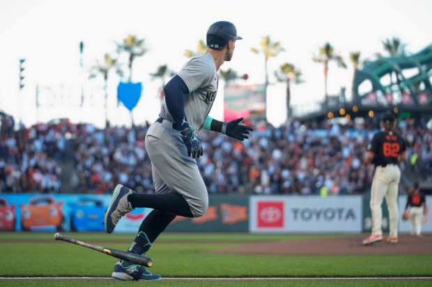 New York Yankees' Aaron Judge runs the bases after hitting a two-run home run off San Francisco Giants pitcher Logan Webb (62) during the first inning of a baseball game Saturday, June 1, 2024, in San Francisco. (AP Photo/Godofredo A. Vásquez)