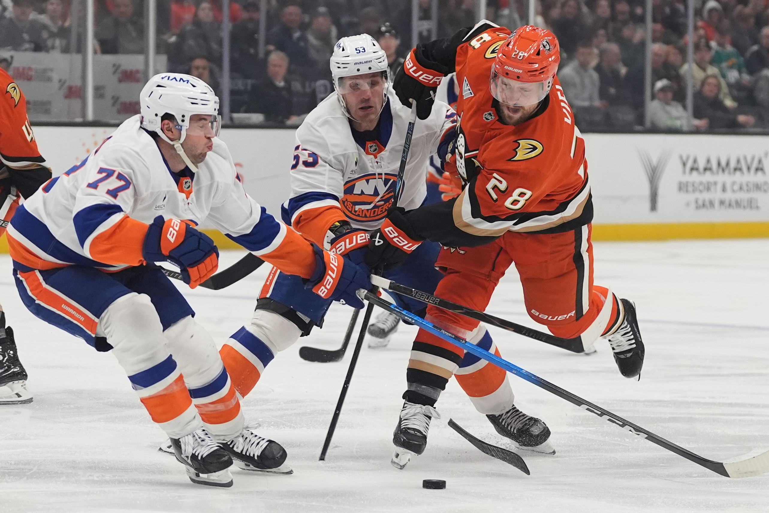Ducks left wing Jeffrey Viel (28) breaks his stick as...