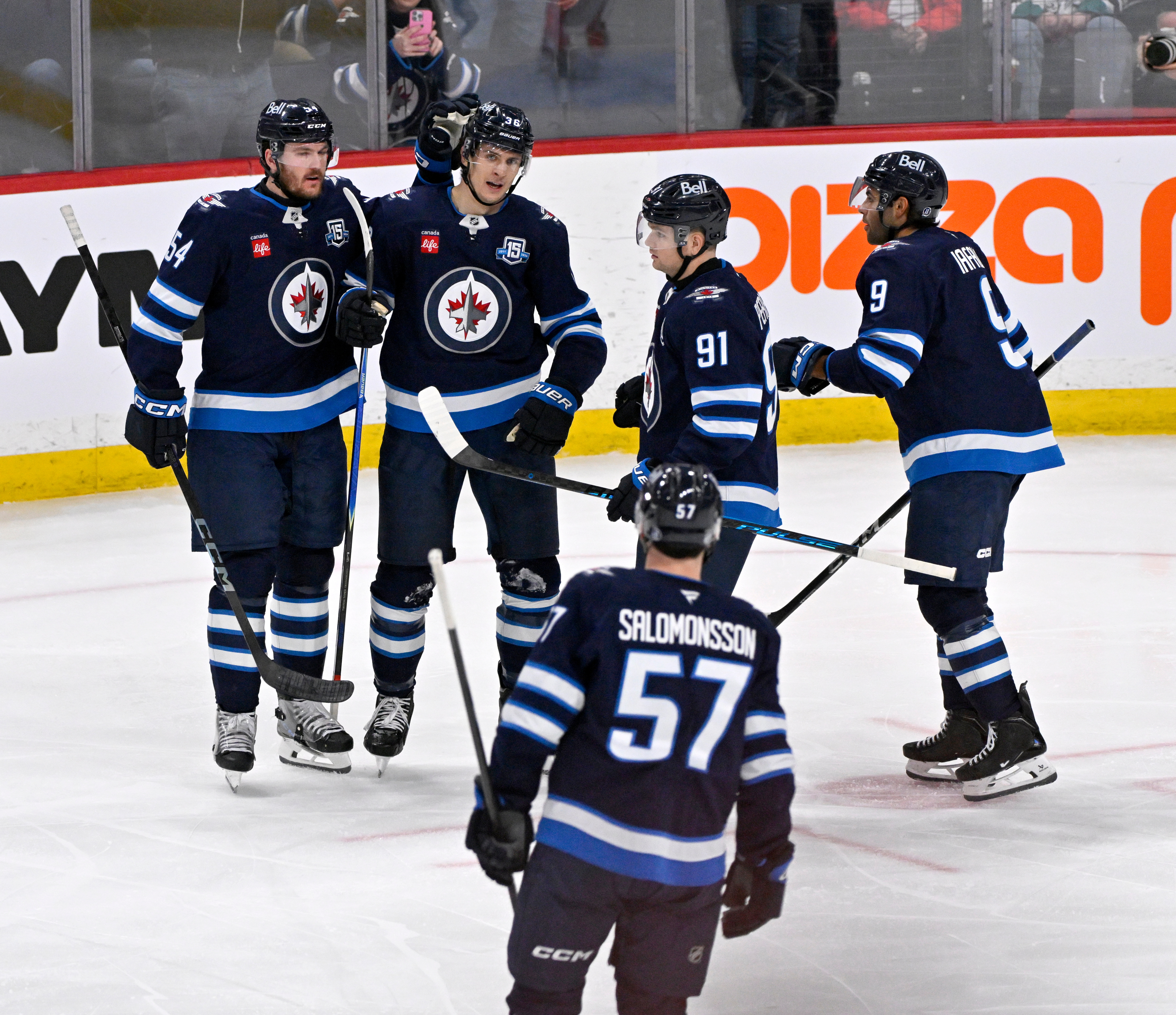 The Winnipeg Jets’ Morgan Barron (36) celebrates his goal with...