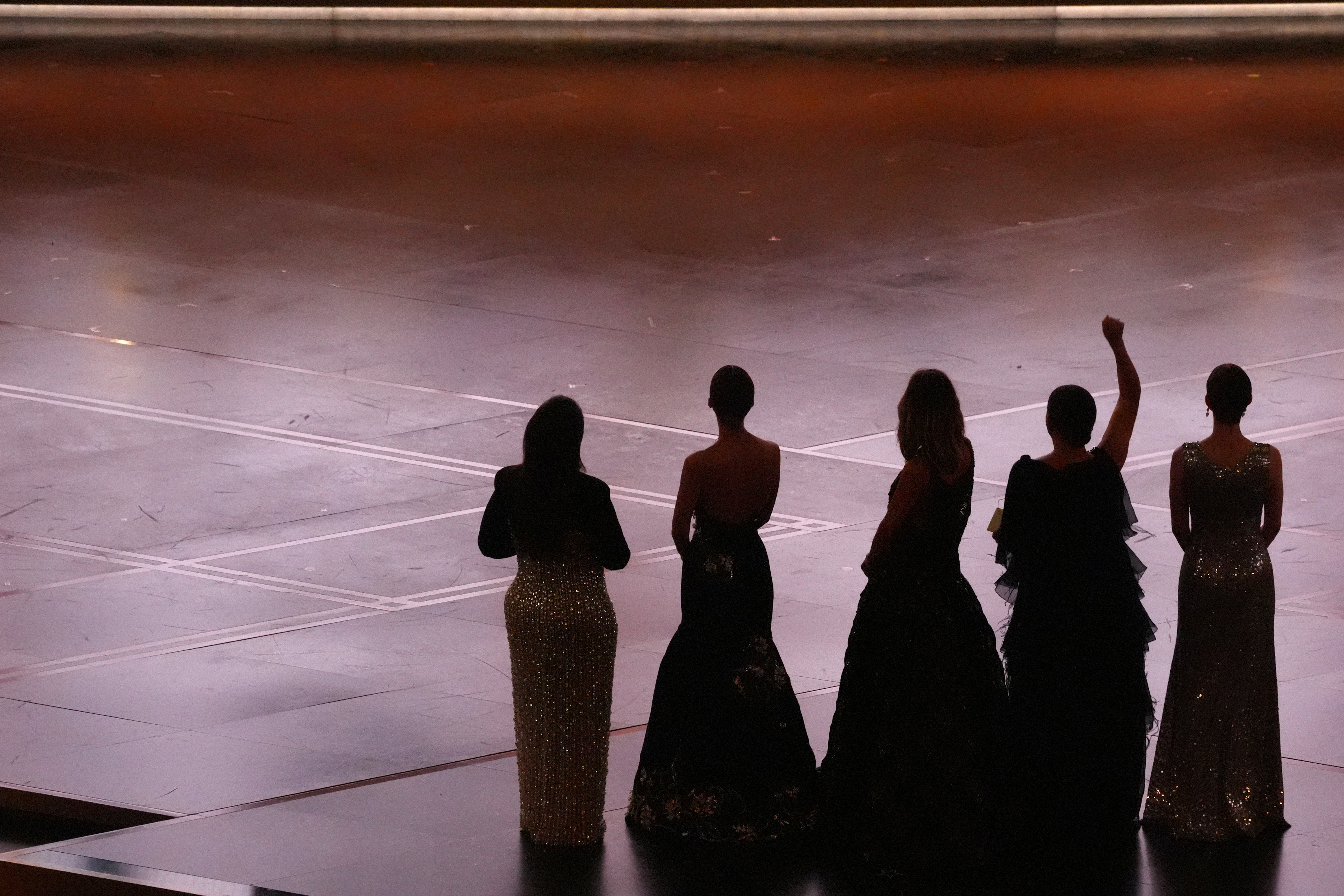 Melissa McCarthy, from left, Rose Byrne, Kristen Wiig, Maya Rudolph, and Ellie Kemper present the award for best original score during the Oscars on Sunday, March 15, 2026, at the Dolby Theatre in Los Angeles. (AP Photo/Chris Pizzello)