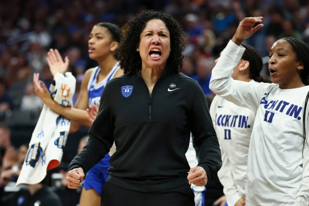 Women's basketball coach celebrates