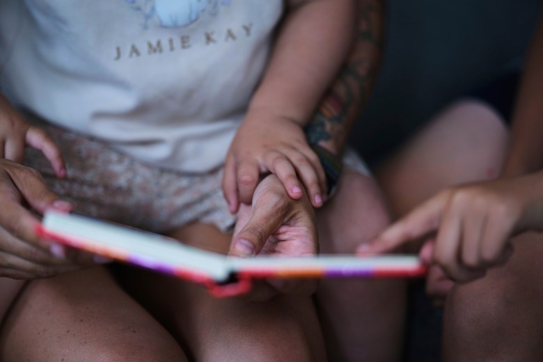 Mother reads to autistic son