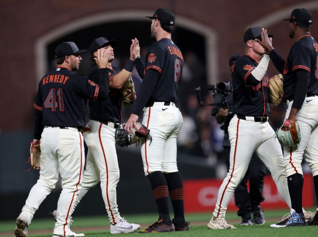 The San Francisco Giants celebrate their 10-2 MLB win against the Sultanes de Monterrey at Oracle Park in San Francisco, Calif., on Monday, March 23, 2026. (Jane Tyska/Bay Area News Group)