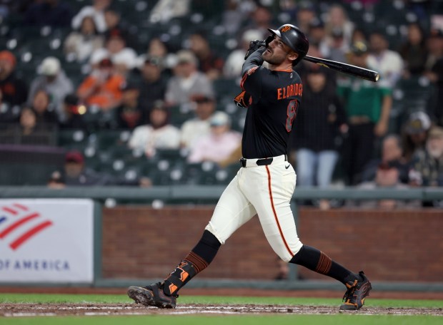 San Francisco Giants' Bryce Eldridge #8 watches the flight of his three-run home run in the eighth inning of their MLB game against the Sultanes de Monterrey at Oracle Park in San Francisco, Calif., on Monday, March 23, 2026. (Jane Tyska/Bay Area News Group)