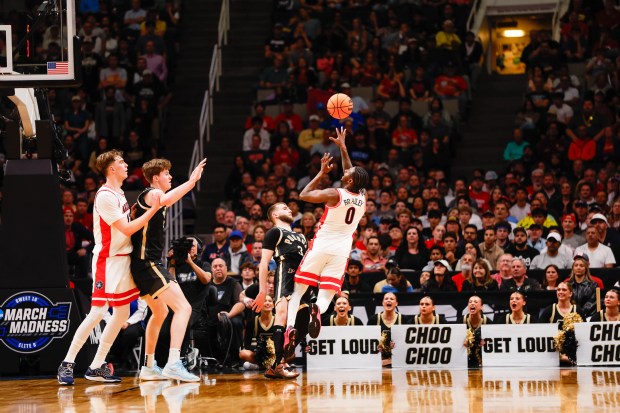 Arizona Wildcats' Jaden Bradley (0) takes a shot against Purdue Boilermakers in the first half during the NCAA Tournament West Regional final at the SAP Center in San Jose, Calif., on Saturday, March 28, 2026.  (Shae Hammond/Bay Area News Group)