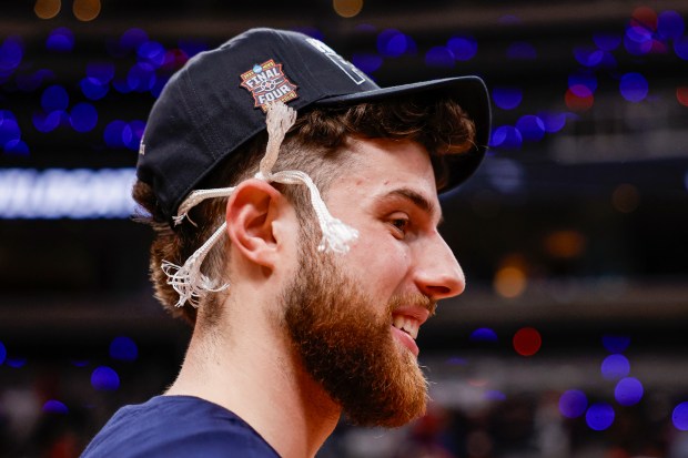 Arizona Wildcats' Anthony Dell'Orso (3) wears a piece of net behind his ear after Arizona Wildcats wins against Purdue Boilermakers during the NCAA Tournament West Regional final at the SAP Center in San Jose, Calif., on Saturday, March 28, 2026.  (Shae Hammond/Bay Area News Group)