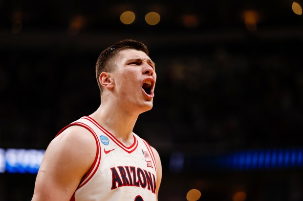 Arizona Wildcats' Ivan Kharchenkov (8) celebrates against Purdue Boilermakers in the second half during the NCAA Tournament West Regional final at the SAP Center in San Jose, Calif., on Saturday, March 28, 2026.  (Shae Hammond/Bay Area News Group)