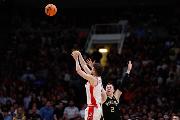 Arizona Wildcats' Anthony Dell'Orso (3) takes a shot against Purdue Boilermakers' Fletcher Loyer (2) in the first half during the NCAA Tournament West Regional final at the SAP Center in San Jose, Calif., on Saturday, March 28, 2026.  (Shae Hammond/Bay Area News Group)