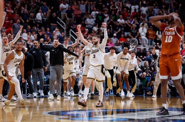 The Purdue Boilermakers celebrate their 79-77 win over the Texas Longhorns for their 2026 NCAA Division I West Regional Semifinal game at the SAP Center in San Jose, Calif., on Thursday, March 26, 2026. (Nhat V. Meyer/Bay Area News Group)