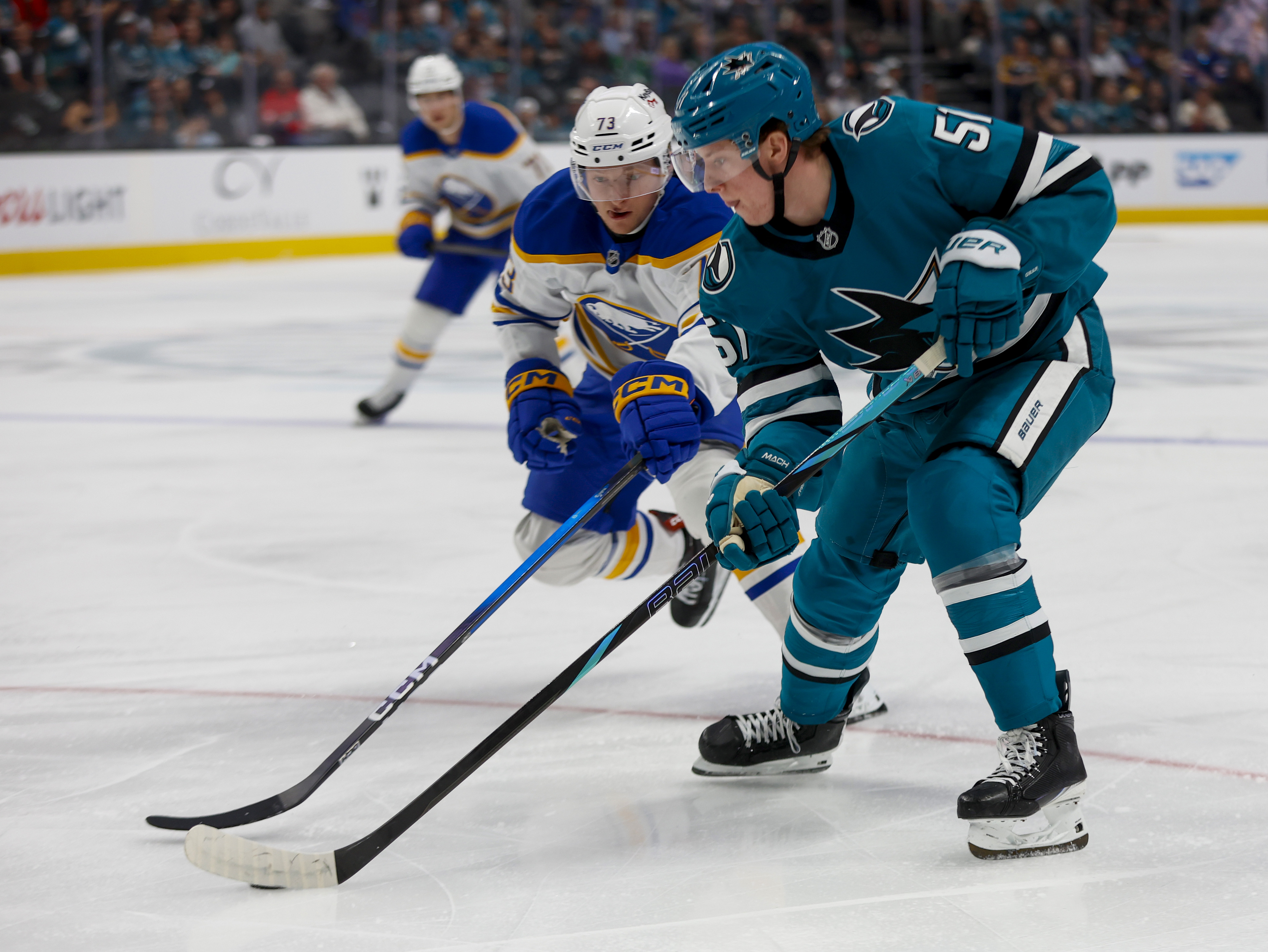 San Jose Sharks' Collin Graf (51) controls the puck against...