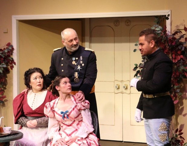 Seated from left, Helen Kim and Samira Sheehan, then standing from left Jason Berner and John Mosa'ati in Bernard Shaw's satire "Arms and the Man" at Campbell Theater through March 22. (Photo courtesy of Judy Potter)