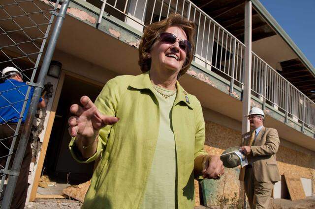 Rancho Cordova City Councilmember Linda Budge celebrates the razing of the First Value Inn in 2013. Budge, who has served on the council since the city's inception, has championed making Rancho Cordova a destination for affordable housing and innovation.
