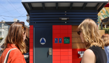 Adrienne Meyers, left, and Grace Shaver check out the new public restroom in the Noe Valley Town Square in San Francisco on Tuesday.