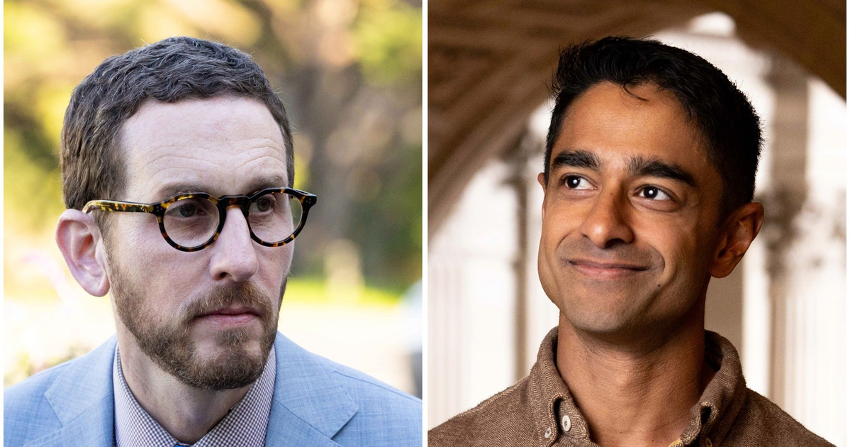 A man with glasses, a beard, and a blue suit looks seriously to the side, while a clean-shaven man in a brown shirt smiles gently against an arched background.