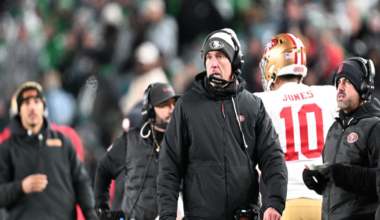 David Lombardi smiles in front of a red background with the Golden Gate Bridge; text reads “DAVID LOMBARDI 49ERS REPORTING @LombardiHimself.”