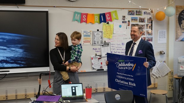 Christina Rick was surprised with a visit from her son Oscar Rick-Metz and Oakland ISD Superintendent Ken Gutman on Wednesday morning.Photo courtesy Oakland ISD