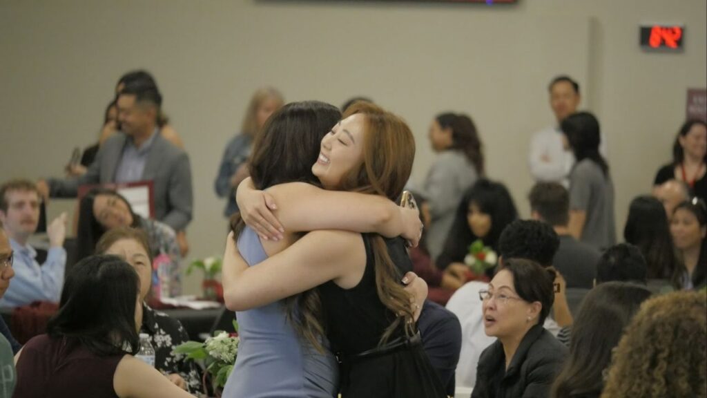 Courtney Hua shares a hug at California Health Sciences University in Clovis on Friday's, March 20, 2026, Match Day. (GV Wire/Jahziel Tello)