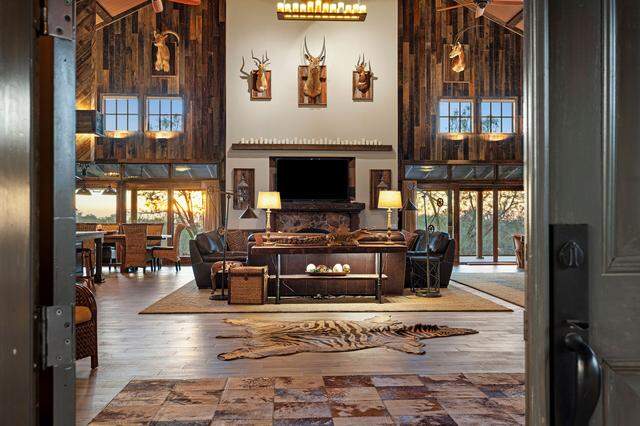 The lodge’s great room — a 1,600-square-foot gathering space — combines kitchen, dining and living areas.