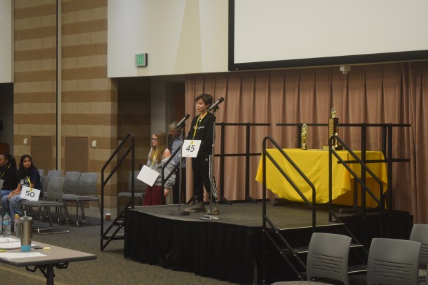 Ahmad Saleh, a sixth grader from the Huda School in Franklin, advances by spelling calzone right in the third round.