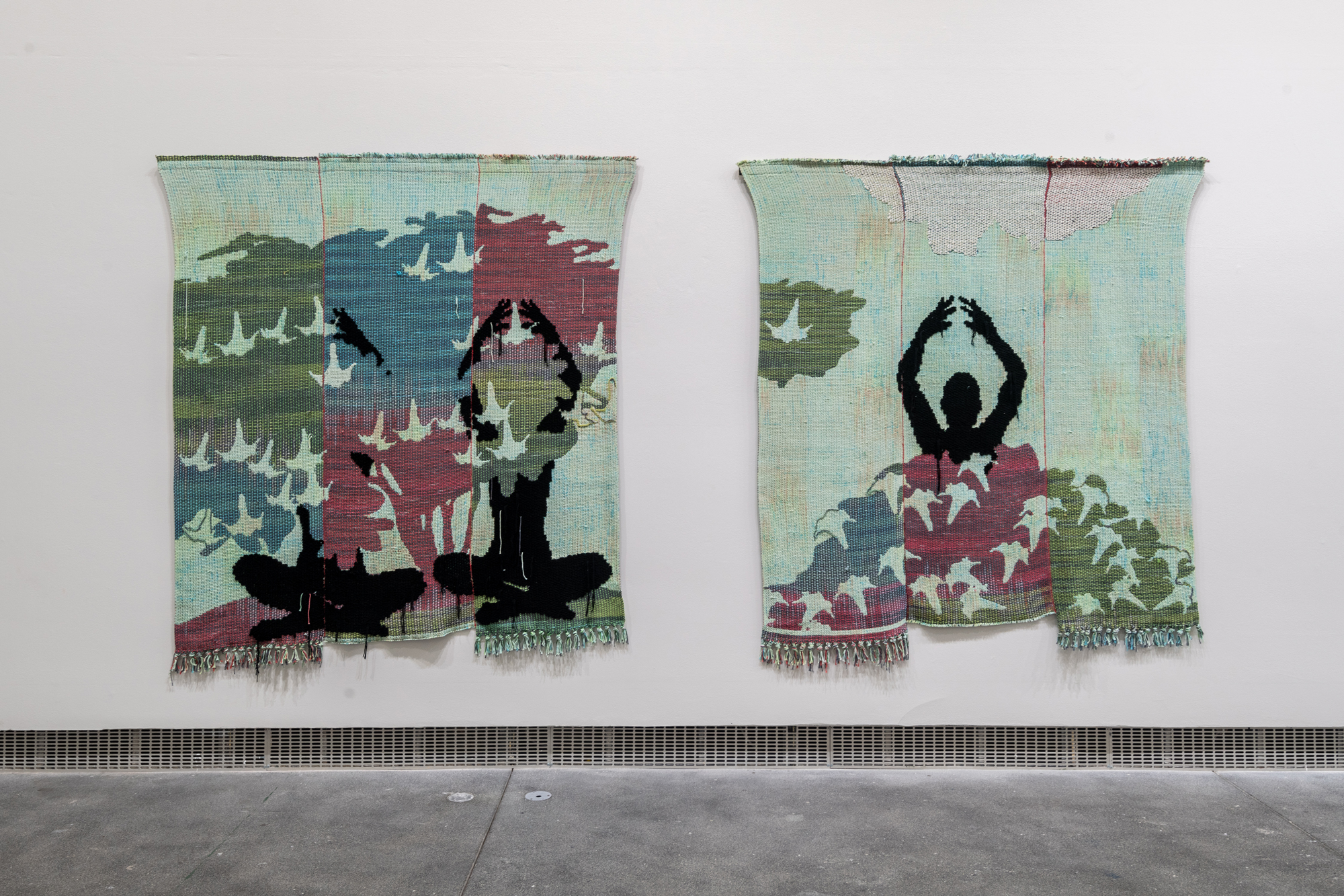 two textiles with plants and seated figures