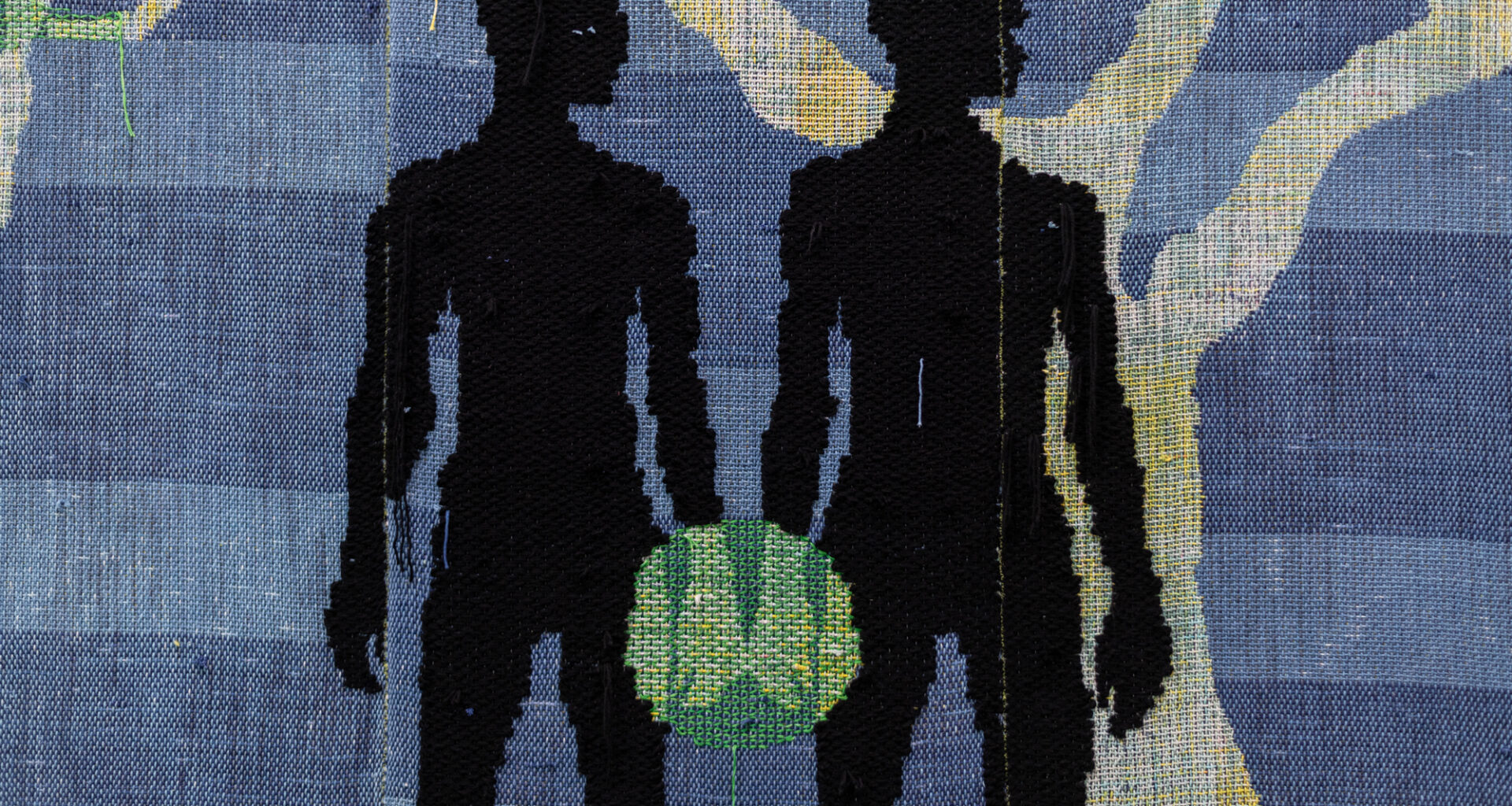 two black silhouettes' hands touch and green glow forms