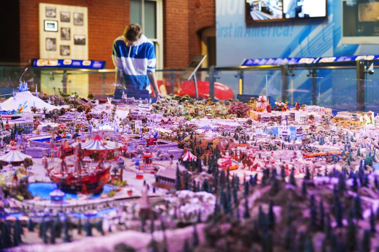 A small-scale model of Disneyland in the museum.