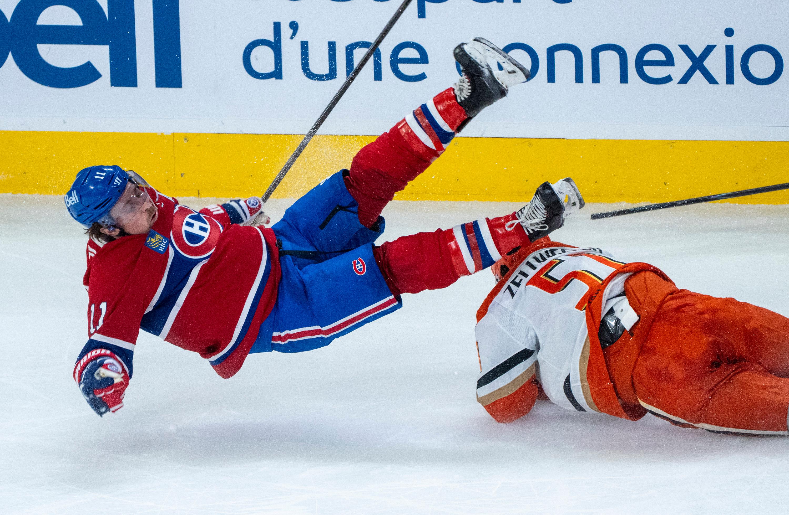 Montreal Canadiens Brendan Gallagher (11) is tripped by Anaheim Ducks;...