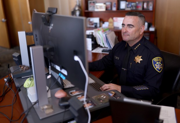 Oakland interim police Chief James Beere works in his office at police headquarters in downtown Oakland, Calif., on Tuesday, March 24, 2026. Beere has applied for the permanent chief's position. (Jane Tyska/Bay Area News Group)