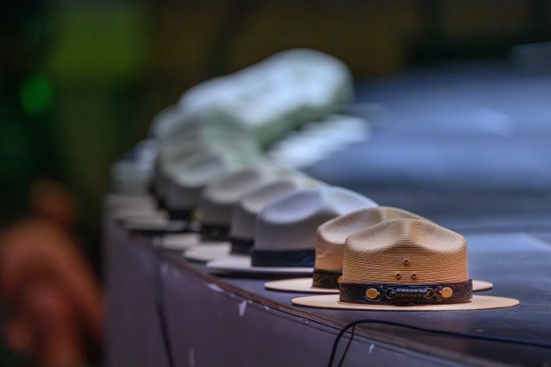 Employees with the US Park Ranger Service place their hats on stage during a public celebration honoring the life and legacy of Betty Reid Soskin held at Calvin Simmons Theatre in Oakland, Calif., on Sunday, March 1, 2026. Soskin passed away last year at the age of 104 and was known for being the oldest National Park Service ranger assigned to the Rosie the Riveter World War II Home Front National Historical Park in Richmond. (Jose Carlos Fajardo/Bay Area News Group)